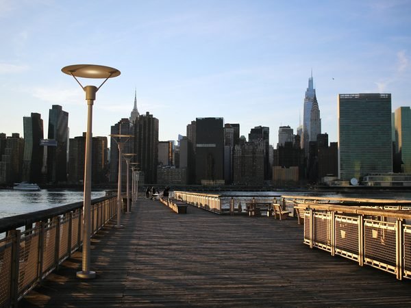 The pier at Gantry Plaza State Park in Long Island City, Manhattan skyline across the river
